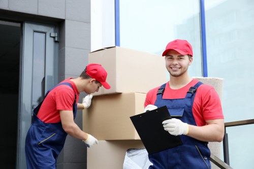 Unpacking boxes in a Haggerston apartment after relocation