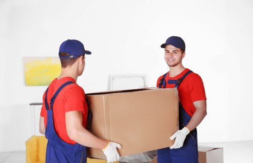 Moving boxes and furniture placed in a Haggerston property