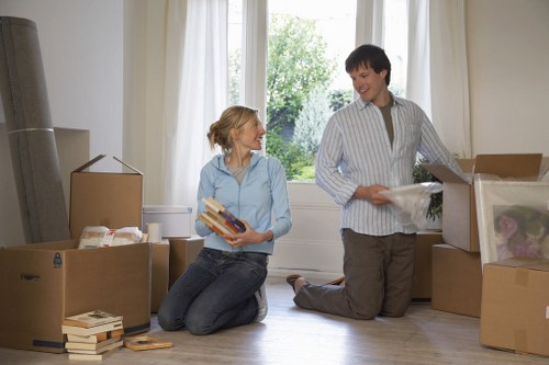 Packed office furniture and equipment ready for a Haggerston business move