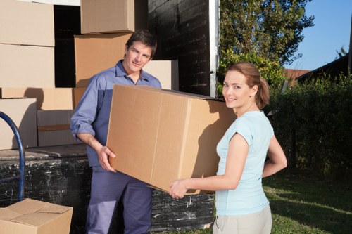 Removal van and movers handling a local East London collection